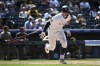Colorado Rockies' Brenton Doyle throws his bat after hitting a triple in the sixth inning of a baseball game against the San Diego Padres, Sunday, Aug. 18, 2024, in Denver. (AP Photo/Geneva Heffernan)