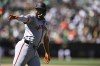 San Francisco Giants' Jerar Encarnacion celebrates after his two-run home run as he runs the bases against the Oakland Athletics during the tenth inning of a baseball game Sunday, Aug. 18, 2024, in Oakland, Calif. (AP Photo/Eakin Howard)