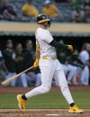 Oakland Athletics' Zack Gelof strikes out during the fifth inning of a baseball game against the Tampa Bay Rays, Tuesday, Aug. 20, 2024, in Oakland, Calif. (AP Photo/Godofredo A. Vásquez)