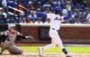 New York Mets' Jesse Winker follows through on a walk off home run against the Baltimore Orioles during the ninth inning of a baseball game, Wednesday, Aug. 21, 2024, in New York. (AP Photo/Noah K. Murray)