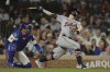 Detroit Tigers' Jace Jung strikes out swinging during the eighth inning of a baseball game against the Chicago Cubs Wednesday, Aug. 21, 2024, in Chicago. (AP Photo/Melissa Tamez)