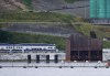 Rail commuters in British Columbia's Lower Mainland must find alternative transportation after Canada's two major railways locked out workers in their first-ever simultaneous stoppage following a break down in talks with the union. The West Coast Express passenger train passes in front of Kinder Morgan's Trans-Mountain marine terminal, in Burnaby, B.C., Tuesday, May 29, 2018. THE CANADIAN PRESS Jonathan Hayward
