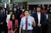 Housing Minister Sean Fraser is expected to unveil details on a Liberal promise to lease federal land to developers to build affordable housing, just before the full federal cabinet kicks off a three-day retreat in Halifax. Prime Minister Justin Trudeau is flanked by Fraser, right, and Treasury Board President Anita Anand, left, during a press conference in Oakville, Ont., on Wednesday, April 24, 2024. THE CANADIAN PRESS/Cole Burston