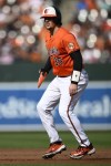 Baltimore Orioles' Adley Rutschman takes a lead from first base during the first inning of a baseball game against the Houston Astros, Saturday, Aug. 24, 2024, in Baltimore. (AP Photo/Nick Wass)