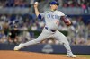 Chicago Cubs starting pitcher Javier Assad throws during the first inning of a baseball game against the Miami Marlins, Sunday, Aug. 25, 2024, in Miami. (AP Photo/Lynne Sladky)