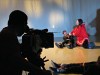 A camerman films Lamech Kadloo of Pond Inlet playing the role of Kiviuq in a scene where many of his fellow hunters are drowned while kayaking when a storm comes up. APTN is launching a channel with programming primarily in Indigenous languages next week. The TV network announced the channel in May as part of an application to consolidate its four programming feeds into two -- one main channel and 