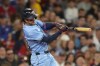 Toronto Blue Jays' Ernie Clement hits a one-run double in the sixth inning of a baseball game against the Boston Red Sox, Thursday, Aug. 29, 2024, in Boston. (AP Photo/Steven Senne)