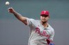 Philadelphia Phillies starting pitcher Taijuan Walker throws during the first inning of a baseball game against the Kansas City Royals Friday, Aug. 23, 2024, in Kansas City, Mo. (AP Photo/Charlie Riedel)