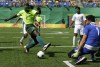 FILE - Brazil's Jefinho, left, kicks the ball as Iran' goalkeeper Meysam Shojaeiyan blocks, during a men's group A preliminary soccer 5-a-side match, at the Paralympic Games event in Rio de Janeiro, Brazil, Tuesday, Sept. 13, 2016. (AP Photo/Leo Correa, File)