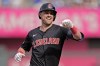 Cleveland Guardians' Lane Thomas celebrates after hitting a two-run home run during the fifth inning of a baseball game against the Kansas City Royals Monday, Sept. 2, 2024, in Kansas City, Mo. (AP Photo/Charlie Riedel)