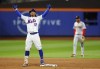 New York Mets shortstop Francisco Lindor (12) reacts after hitting a RBI double against the Boston Red Sox during the eighth inning of a baseball game, Tuesday, Sept. 3, 2024, in New York. (AP Photo/Noah K. Murray)