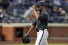 New York Mets pitcher Jose Quintana reacts while walking to the dugout after being taken out of the game during the seventh inning of a baseball game against the Cincinnati Reds, Saturday, Sept. 7, 2024, in New York. (AP Photo/Adam Hunger)