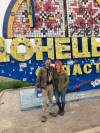Supplied Winnipeg&rsquo;s Brent DePape, along with longtime Canadian volunteer April Huggett, at the sign marking the border of Ukraine&rsquo;s eastern Donetsk Oblast region during DePape&rsquo;s third volunteer trip to the country earlier this year.