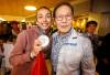 JOHN WOODS / FREE PRESS
                                Skylar Park, Olympic bronze medalist in taekwondo, shows off her medal with her grandfather Grandmaster Duek Hwa Park as she arrives at the Winnipeg airport as she returns from Paris Monday, August 12, 2024. Reporter: ken