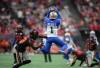 Winnipeg Blue Bombers&rsquo; Deatrick Nichols (1) intercepts a pass intended for B.C. Lions&rsquo; Alexander Hollins (13) during the first half of a CFL football game, in Vancouver, B.C., Sunday, Aug. 18, 2024. (Darryl Dyck / The Canadian Press)
