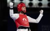 Canada's Skylar Park celebrates after defeating Laetitia Aoun to win the bronze medal in the women's 57kg taekwondo at the Summer Olympics, Thursday, August 8, 2024 in Paris.  THE CANADIAN PRESS/Adrian Wyld