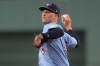 Toronto Blue Jays' Bowden Francis winds up for a pitch to a Boston Red Sox batter in the first inning of a baseball game Thursday, Aug. 29, 2024, in Boston. (AP Photo/Steven Senne)