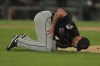 Cleveland Guardians' pitcher Ben Lively lays on the field after being hit by a ball during the second inning of a baseball game against the Chicago White Sox, Tuesday, Sept. 10, 2024, in Chicago. (AP Photo/Melissa Tamez)