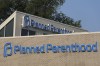 FILE - A Planned Parenthood sign is displayed on the outside of the clinic, Aug. 1, 2023, in Indianapolis. (AP Photo/Darron Cummings, File)