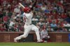 St. Louis Cardinals' Paul Goldschmidt follows through on an RBI double during the eighth inning of a baseball game against the Cincinnati Reds Wednesday, Sept. 11, 2024, in St. Louis. (AP Photo/Jeff Roberson)