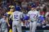 New York Mets' Brandon Nimmo (9) celebrates his three run home run off Philadelphia Phillies' Aaron Nola with Mets' Francisco Lindor (12) during the fifth inning of a baseball game, Friday, Sept. 13, 2024, in Philadelphia. (AP Photo/Derik Hamilton)