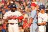 Toronto Blue Jays' Vladimir Guerrero Jr. (27) smiles towards St. Louis Cardinals first base Paul Goldschmidt (46) after hitting an RBI single during seventh inning MLB baseball action in Toronto on Saturday, September 14, 2024. THE CANADIAN PRESS/Chris Young