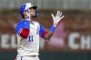 Atlanta Braves' Orlando Arcia (11) gives praise when he reaches second base after hitting a double to center field in the third inning of a baseball game against the Los Angeles Dodgers, Saturday, Sept. 14, 2024, in Atlanta. (AP Photo/Jason Allen)