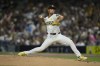 San Diego Padres starting pitcher Yu Darvish works against a Houston Astros batter during the first inning of a baseball game Monday, Sept. 16, 2024, in San Diego. (AP Photo/Gregory Bull)