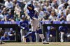 FILE -Toronto Blue Jays' Bo Bichette hits an RBI and reaches base on a fielding error by Seattle Mariners shortstop J.P. Crawford during the eighth inning in a baseball game, Saturday, July 6, 2024, in Seattle. (AP Photo/John Froschauer, File)
