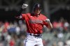 Cleveland Guardians' Kyle Manzardo celebrates hitting a solo home run during the first inning of a baseball game against the Minnesota Twins, Thursday, Sept. 19, 2024, in Cleveland. (AP Photo/Nick Cammett)