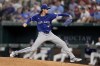 Toronto Blue Jays starting pitcher Kevin Gausman throws to the Texas Rangers in the fifth inning of a baseball game in Arlington, Texas, Thursday, Sept. 19, 2024. (AP Photo/Tony Gutierrez)
