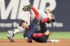 Toronto Blue Jays short stop Ernie Clement tumbles as Boston Red Sox Jarren Duran steals second base during fourth inning MLB baseball action in Toronto on Monday, Sept. 23, 2024. THE CANADIAN PRESS/Chris Young