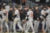 The Baltimore Orioles celebrate after they defeated the New York Yankees in a baseball game, Wednesday, Sept. 25, 2024, in New York. (AP Photo/Bryan Woolston)