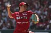 FILE - Diablos Rojos' pitcher Trevor Bauer throws against New York Yankees' Anthony Volpe during the first inning of a baseball exhibition game at Alfredo Harp Helu Stadium in Mexico City, Sunday, March 24, 2024. (AP Photo/Fernando Llano, File)