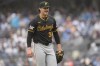 Pittsburgh Pirates' Paul Skenes smiles after the second inning of a baseball game against the New York Yankees, Saturday, Sept. 28, 2024, in New York. (AP Photo/Frank Franklin II)