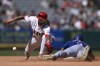 Texas Rangers' Leody Taveras steals second as Los Angeles Angels shortstop Jack López reaches for the ball during the seventh inning of a baseball game, Sunday, Sept. 29, 2024, in Anaheim, Calif. (AP Photo/John McCoy)