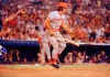 FILE - Pete Rose of the Cincinnati Reds in action at the bat against the Atlanta Braves in Atlanta, Aug. 2, 1978. At left is Atlanta catcher Joe Nolan. (AP Photo, File)