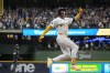 Milwaukee Brewers' Garrett Mitchell celebrates afrer hitting a two-run home run during the eighth inning of Game 2 of a National League wild card baseball game against the New York Mets Wednesday, Oct. 2, 2024, in Milwaukee. (AP Photo/Morry Gash)