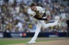 San Diego Padres starting pitcher Joe Musgrove throws to an Atlanta Braves batter during the first inning in Game 2 of an NL Wild Card Series baseball game Wednesday, Oct. 2, 2024, in San Diego. (AP Photo/Gregory Bull)