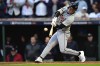 Detroit Tigers' Kerry Carpenter hits a three-rum home run in the ninth inning during Game 2 of baseball's AL Division Series against the Cleveland Guardians, Monday, Oct. 7, 2024, in Cleveland. (AP Photo/David Dermer)
