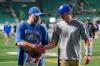 Winnipeg Blue Bombers offensive coordinator Buck Pearce shakes quarterback Zach Collaros&rsquo; hand after CFL football action against Saskatchewan Roughriders in Regina, on Sunday, September 1, 2024. (Heywood Yu / The Canadian Press)