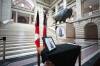 Ruth Bonneville / Free Press
                                Photos of the late Assembly of Manitoba Chiefs Grand Chief, Cathy Merrick, are displayed at the base of the grand staircase of the Legislative Building, Monday. A book of condolences will be set up there Tuesday while her body lies in state ahead of her funeral and burial at her home community of Pimicikamak Cree Nation.