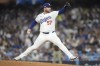 Los Angeles Dodgers pitcher Ryan Brasier throws to a San Diego Padres batter during the eighth inning in Game 2 of a baseball NL Division Series, Sunday, Oct. 6, 2024, in Los Angeles. (AP Photo/Ashley Landis)