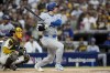 Los Angeles Dodgers' Shohei Ohtani grounds out during the first inning in Game 4 of a baseball NL Division Series against the San Diego Padres, Wednesday, Oct. 9, 2024, in San Diego. (AP Photo/Ashley Landis)