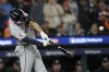 Cleveland Guardians' David Fry hits a two-run home run in the seventh inning during Game 4 of a baseball American League Division Series against the Detroit Tigers, Thursday, Oct. 10, 2024, in Detroit.(AP Photo/Paul Sancya)