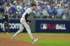 New York Yankees relief pitcher Luke Weaver celebrates the final out in a 3-1 victory over the Kansas City Royals in Game 4 of an American League Division baseball playoff series Thursday, Oct. 10, 2024, in Kansas City, Mo. (AP Photo/Charlie Riedel)