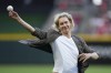 FILE - Former Cincinnati Reds player Bronson Arroyo throws out a ceremonial first pitch before a baseball game between the Reds and the Milwaukee Brewers, July 15, 2023, in Cincinnati. (AP Photo/Darron Cummings, File)