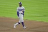 Los Angeles Dodgers' Mookie Betts celebrates after a two run double against the New York Mets during the fourth inning in Game 4 of a baseball NL Championship Series, Thursday, Oct. 17, 2024, in New York. (AP Photo/Adam Hunger)