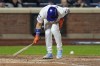 New York Mets' Francisco Alvarez gets hit by pitch against the Los Angeles Dodgers during the fifth inning in Game 4 of a baseball NL Championship Series, Thursday, Oct. 17, 2024, in New York. (AP Photo/Ashley Landis)