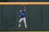Toronto Blue Jays center fielder Daulton Varsho catches a fly ball off the bat of Atlanta Braves' Michael Harris II in the fourth inning of a baseball game Friday, Sept. 6, 2024, in Atlanta. (AP Photo/John Bazemore)